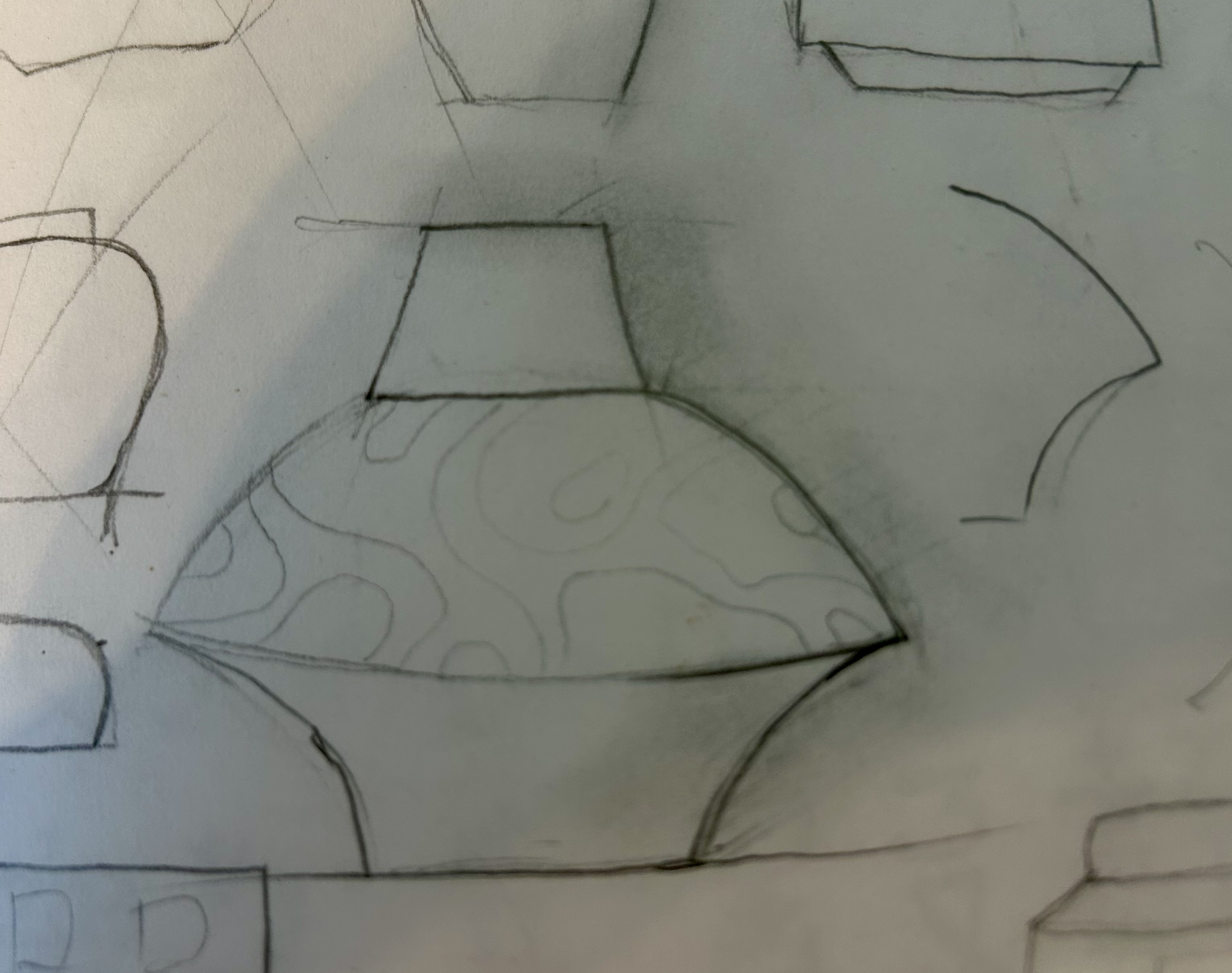 Pencil sketches exploring ceramic jug shapes and geometric decoration